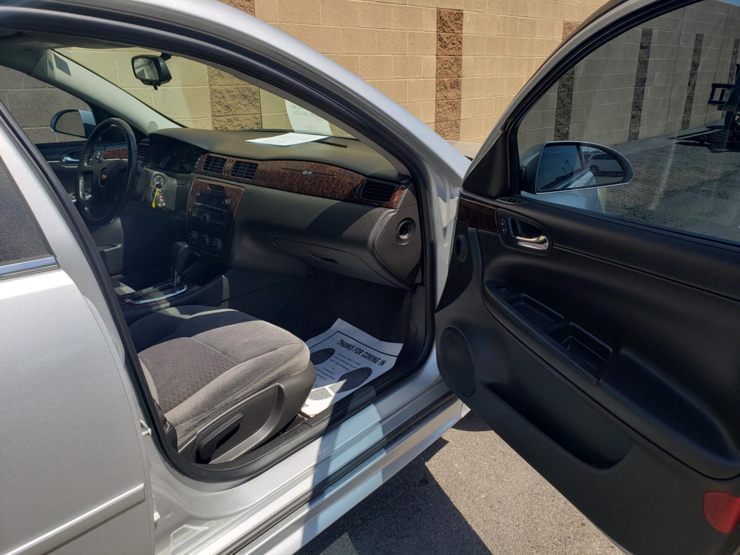 2013 silver /gray and black Chevrolet Impala LS (2G1WA5E32D1) with an 3.6L V6 DOHC 16V FFV engine, 6-Speed Automatic transmission, located at 323 E Dunlap Ave., Phoenix, AZ, 85020, (602) 331-9000, 33.567677, -112.069000 - 2013 Chevrolet Impala LS, EXCELLENT condition, A Real Must See!!.... No accidents, Power everything, Ice cold ac, Gray and Black interior with gary cloth seats in near perfect condition, power windows, power door locks, clean Arizona title, Runs and Drives Excellent. Very clean inside and out, Any q - Photo#12